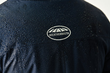 Buy the WeatherBeeta Navy Iris Kyla II Waterproof Jacket | Online for Equine