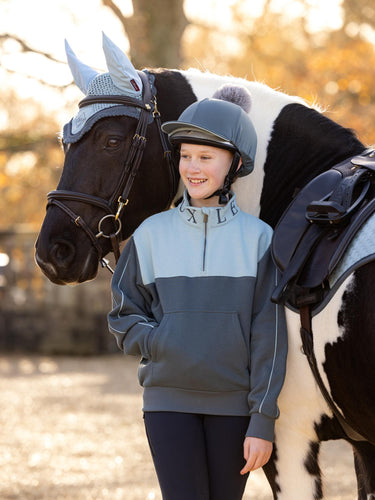 Buy the LeMieux Young Rider Petrol/Glacier Kate Quarter Zip Sweater | Online for Equine